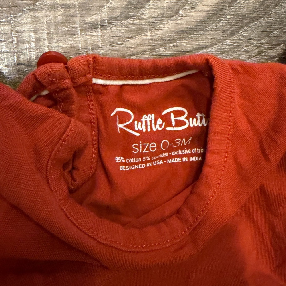 Ruffle Butts Long-Sleeve Ruffle One-Piece in Rust Orange - Picture 2 of 4
